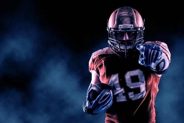 Football player pointing forward