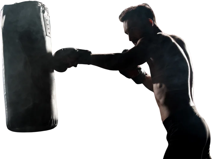 Man punching a punching bag